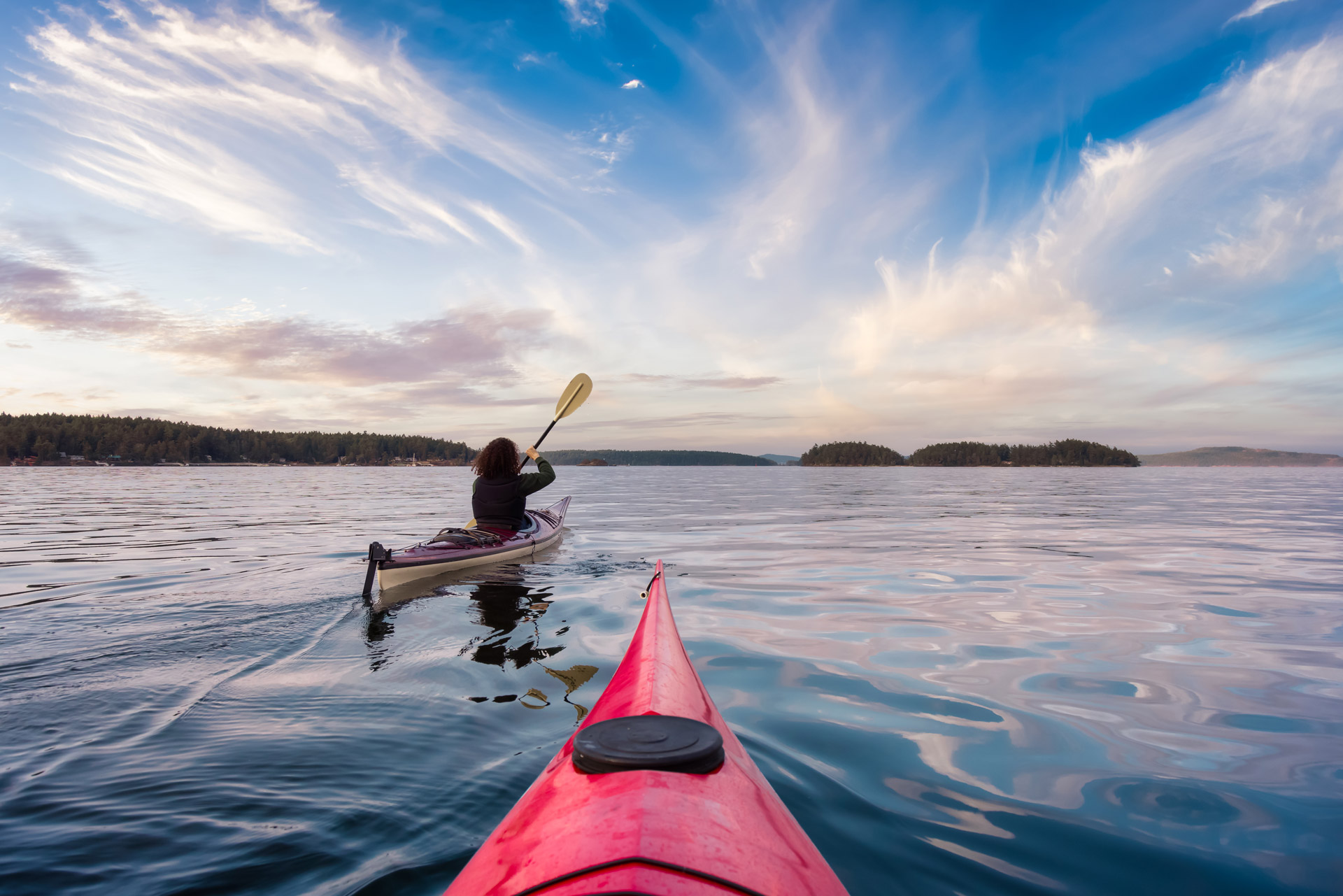 woman kayaking on the ocean